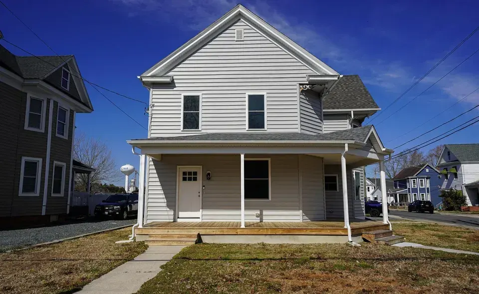 Restored 1890s Victorian at 111 East Jewell Street in Delmar with new siding, roof, and porch